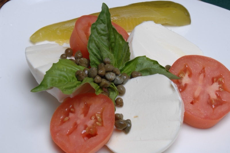 Fresh caprese pizza with mozzarella and basil Dallas